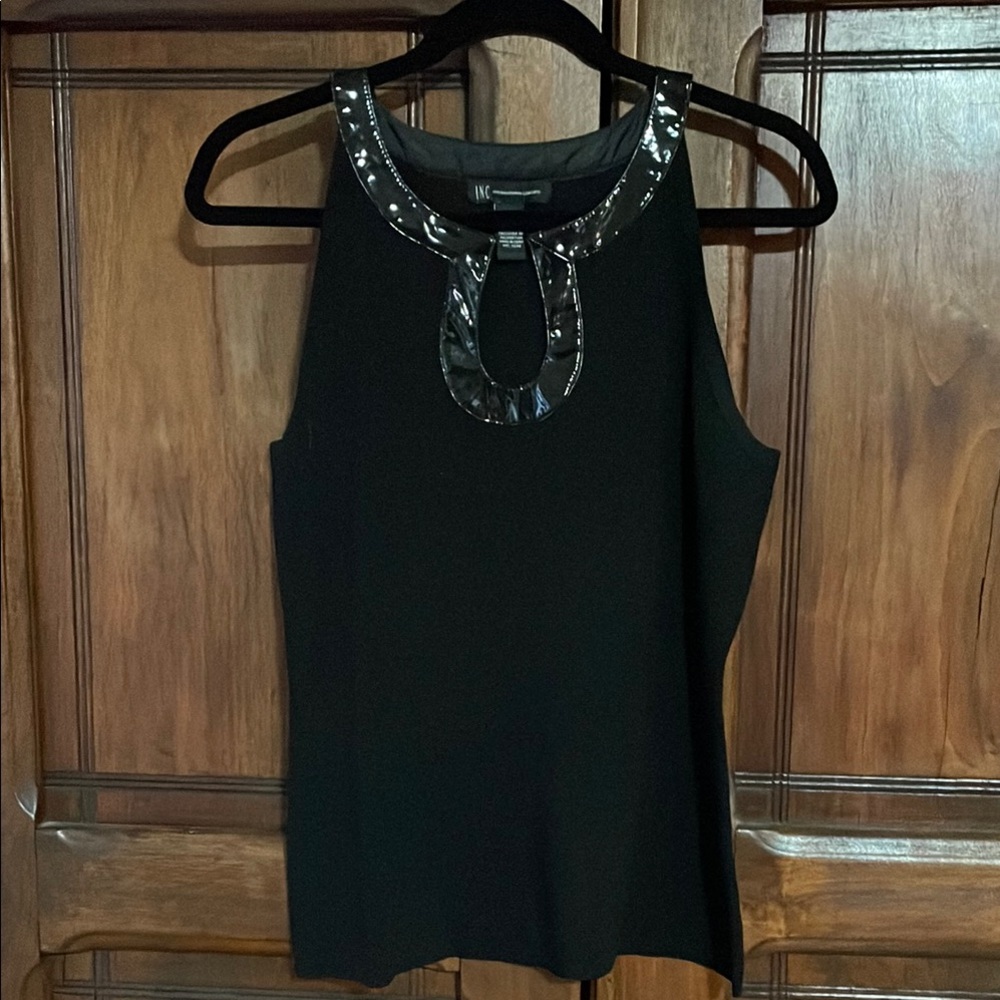 Black Sleeveless Top with Embellished Neckline